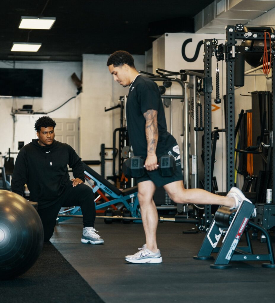 Athletes training side by side in athlete performance training at Stealth Performance