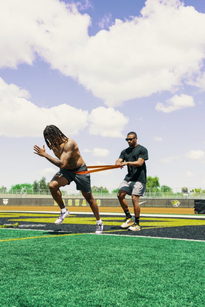 Band-resisted sprint drill with a Stealth Performance coach in Phoenix